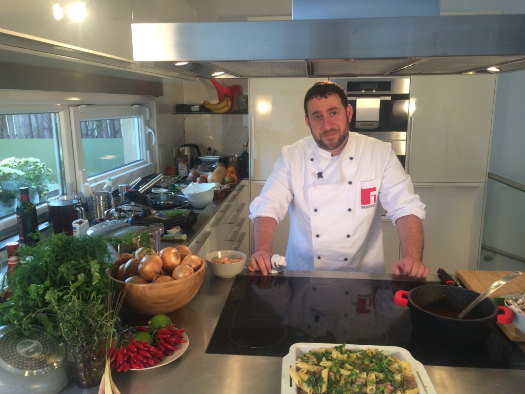 Professional chef preparing gourmet kosher cuisine