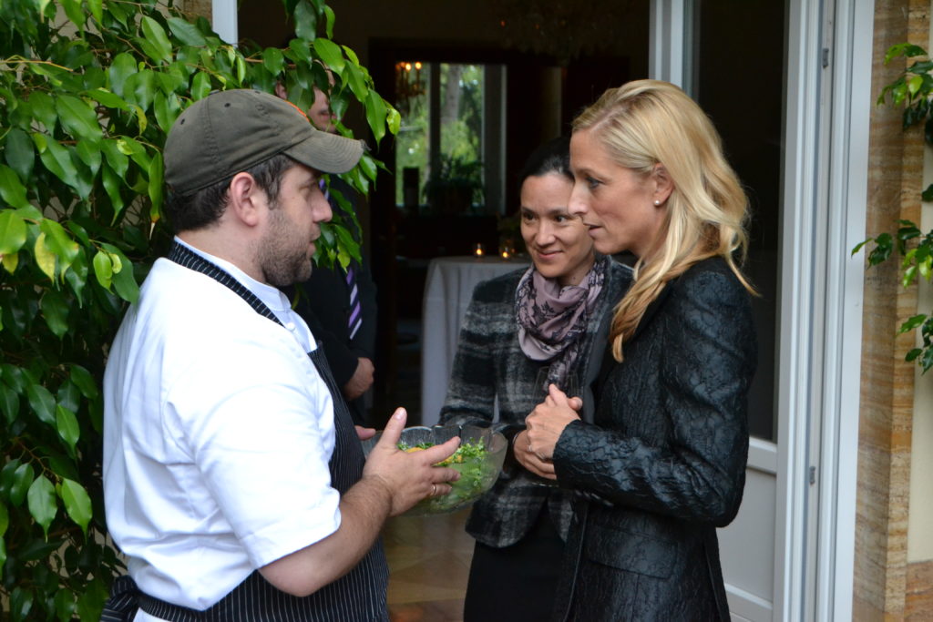 Kosher chef serving guests at a Miami private event