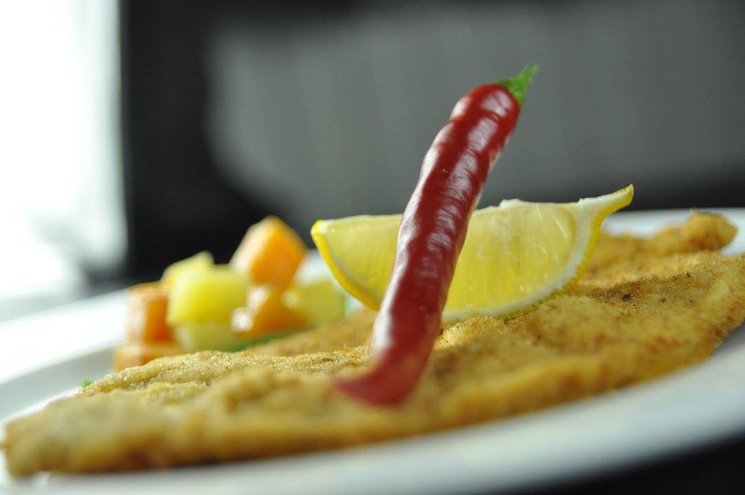 Glatt kosher schnitzel plated for a Miami bar mitzvah